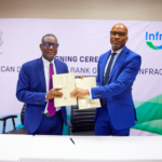 Director General of the African Development Bank's Nigeria Country Department, Lamin Barrow (left), and Chinua Azubike, CEO of InfraCredit, exchange the deed of agreement for a $15 million subordinated loan signed on June 14, 2024, to enhance infrastructure financing in Nigeria