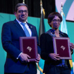 Haytham El Maayergi, Executive Vice President, Global Trade Bank, Afreximbank (left) and Mrs. Smangele Mandidi, Acting Managing Director of CBZ Bank during the signing ceremony