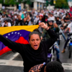 Protesters in Caracas demonstrate against the results of Venezuela’s presidential election