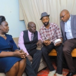 From L-R; Eng. Rosemary Oduor, General Manager (GM), Commercial Services & Sales, Kenya Power, Dr. (Eng) Joseph Siror, MD & CEO, Kenya Power, Lazarus Mwangi, Prepaid Customer and Eng. Simon Kamau, Ag. Manager, Power System Design and Development updating a prepaid meter in Nairobi in June 2024.