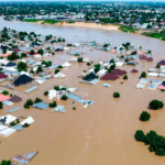 Houses are partially submerged following a dam collapse in Maiduguri, Nigeria, Tuesday, September 10, 2024