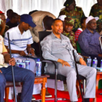 Principal Secretary, State Department for East African Community Abdi Dubat (middle) and Narok deputy governor Tamalinye Koech (Left), among other guests during the 13th Mara day celebrations held at Sekenani area in Narok West sub county.